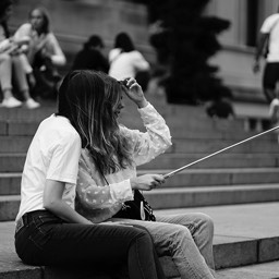 Girls preparing for a selfie on the stairs of the Metropolitan Museum of Art by Dana Lance for Danajohn Photography © danajohn302