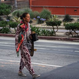 Lone women at a Black Lives Matter rally in downtown Los Angeles by Dana Lance for Danajohn Photography © danajohn302